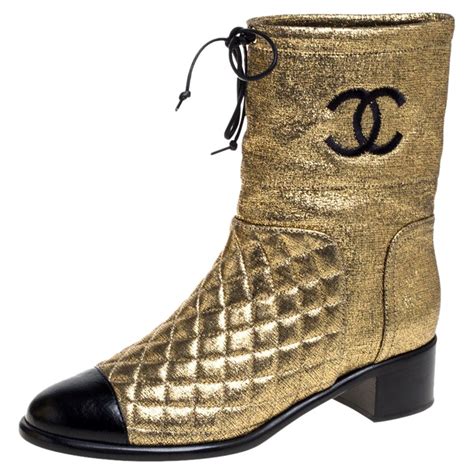 chanel gold boots|More.